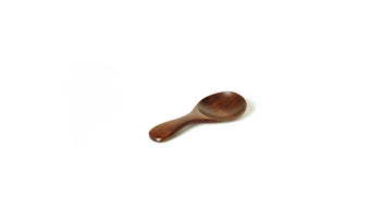 Small round dark wooden spoon